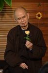 Thich Nhat Hanh and flower 2.jpg